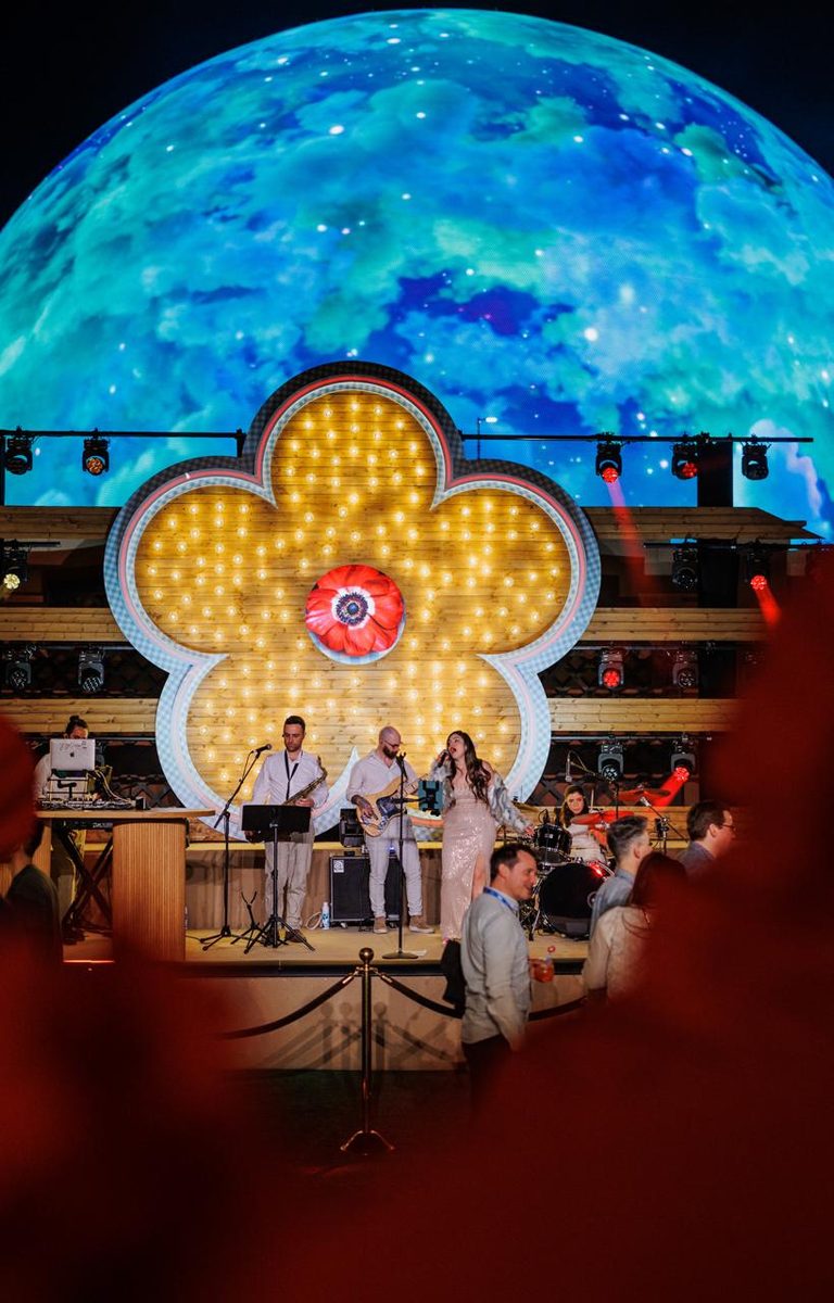 Sunny Jazz Band on stage with the Sphere behind at Wynn Las Vegas Wiz corporate event