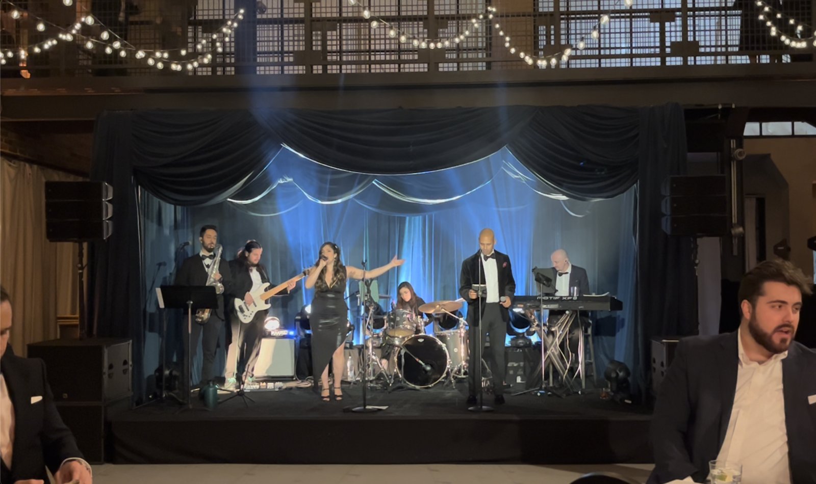 Sunny Jazz Band 6-piece live band performing at a corporate end-of-year celebration at Artifact Events Chicago